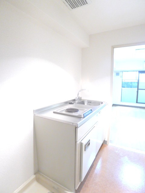 Kitchen. With stove