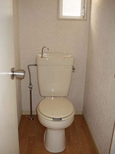 Toilet. Convenient to ventilation with a small window toilet