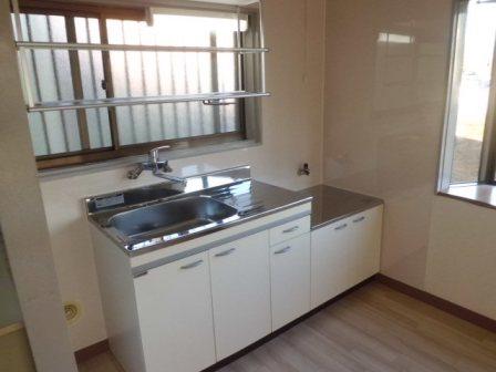 Kitchen. Kitchen brand new. It is a bright kitchen with a window.