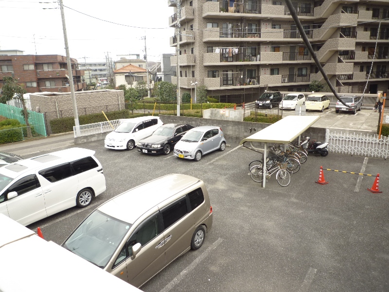 Parking lot. Station is near property, but there is also a parking lot