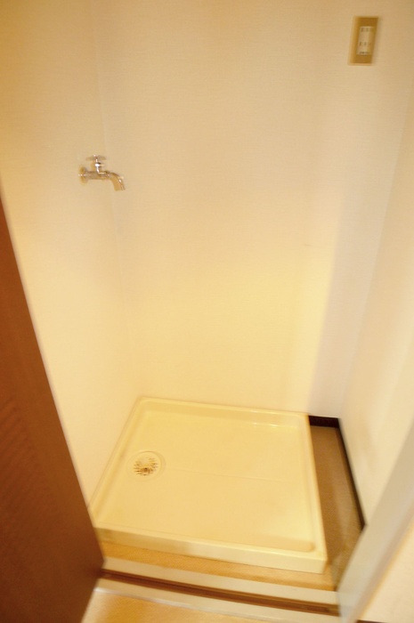 Other Equipment. Washing machine in the room
