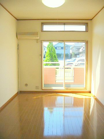 Living and room. There are ceiling high sense of openness