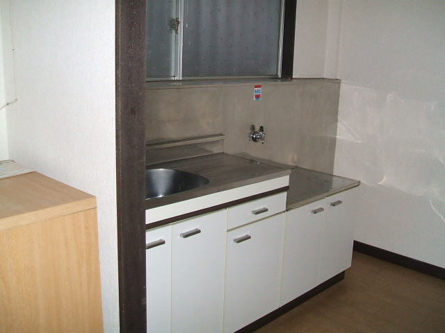Kitchen. Bright kitchen with a window. Gas stove installation Allowed