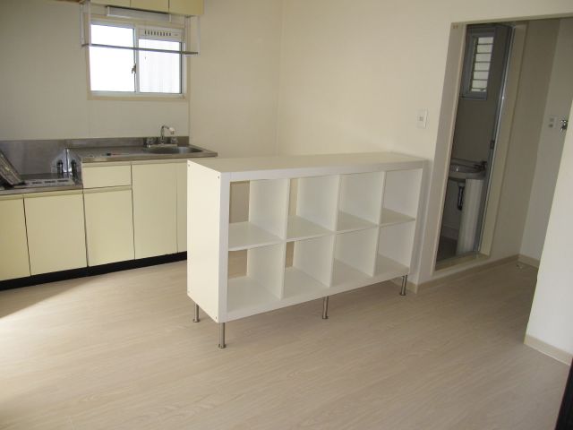 Living and room. Nice in the dining kitchen white