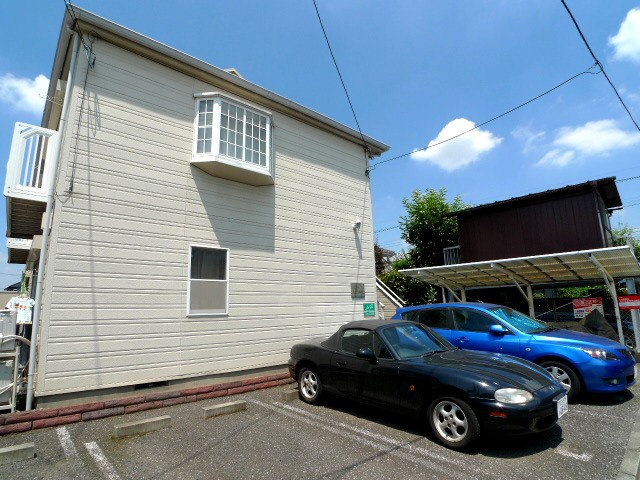 Building appearance. Parking on site