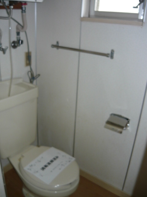Toilet. Convenient to ventilation small window with toilet