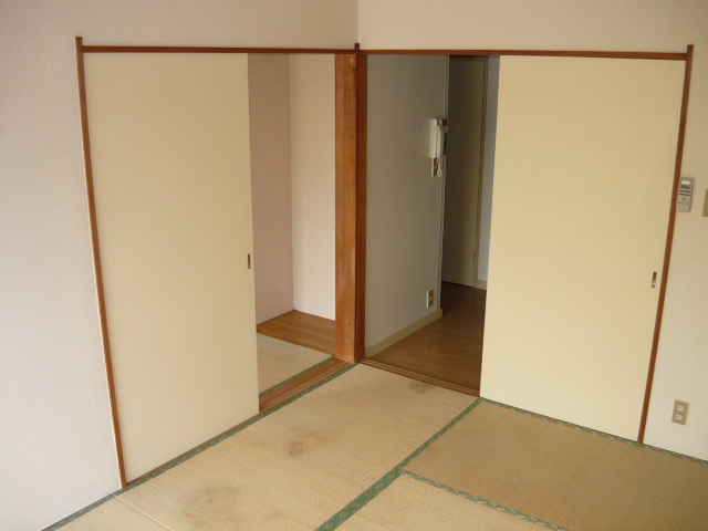Other room space. Each room has been divided by a sliding door.