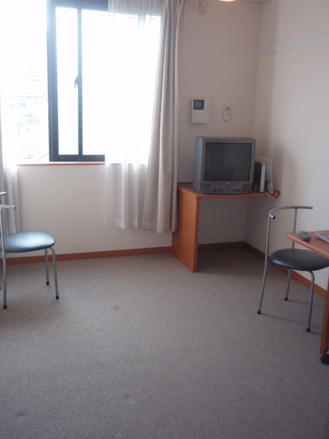 Living and room. There are ceiling high sense of openness. Plenty of sunshine