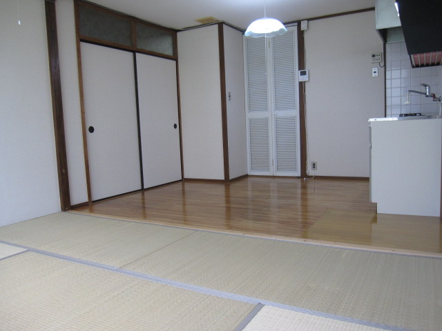 Kitchen. Kitchen seen from the Japanese-style room. In family recreation