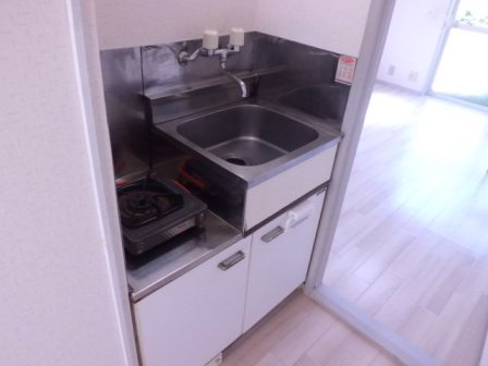 Kitchen. 1 lot gas stoves installed Friendly Kitchen. Convenient built under storage
