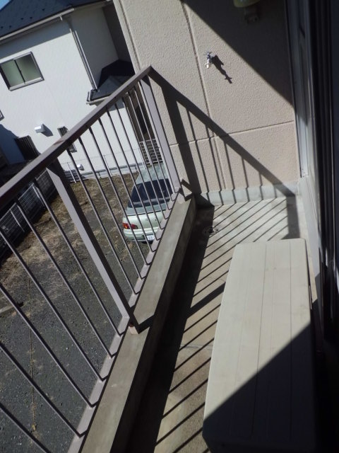 Balcony. Washing machine storage is here.