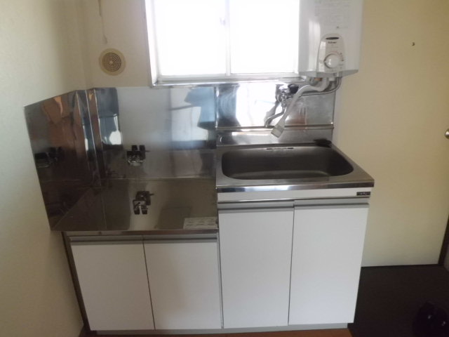 Kitchen. Gas stove installed Friendly Kitchen. There is also a ventilation good window