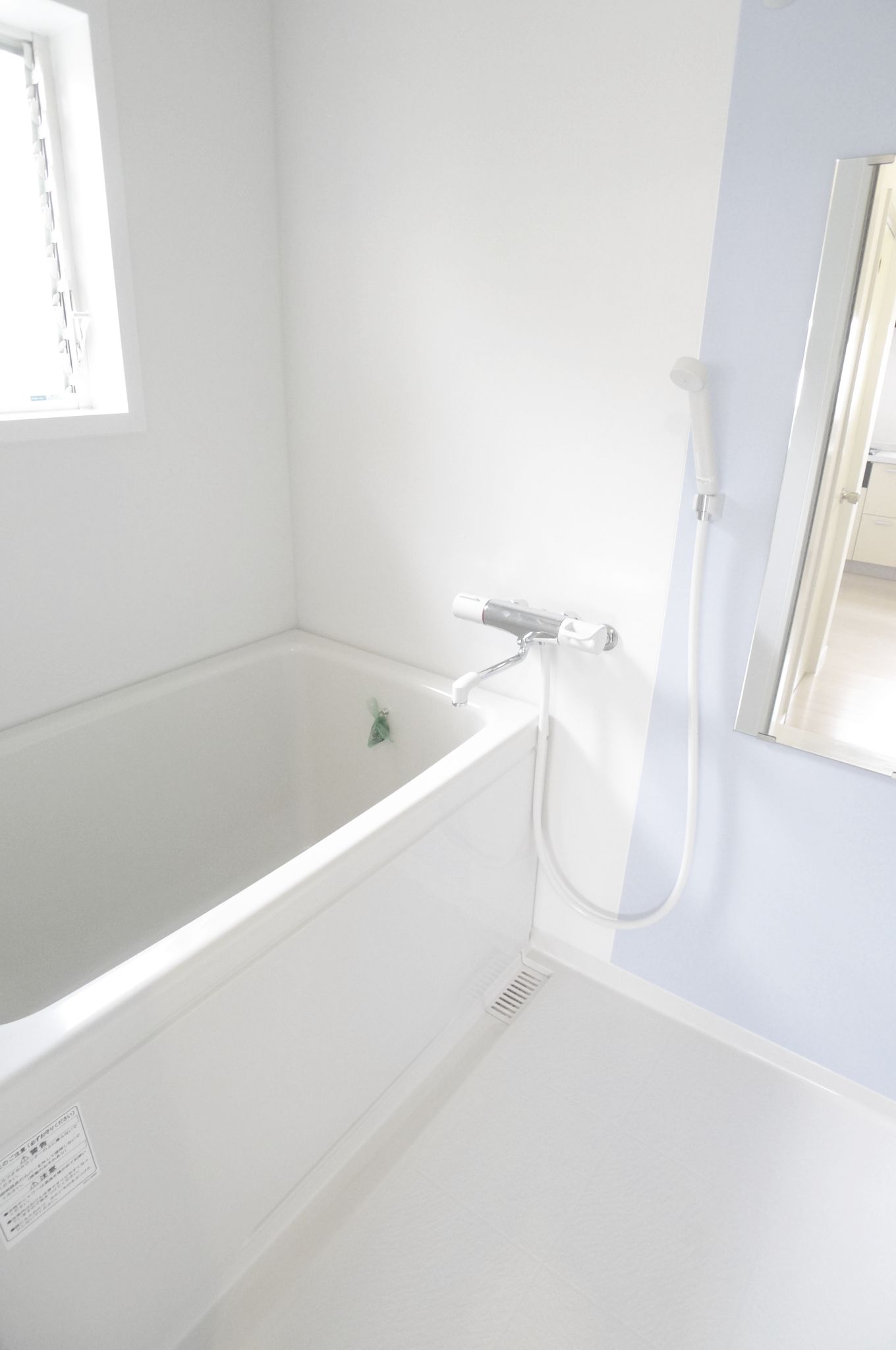 Bath. It comes with a window to the bus