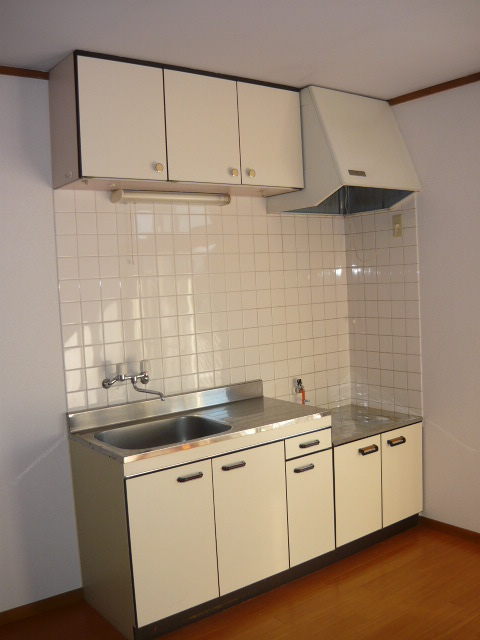 Kitchen. Gas stove installed Friendly Kitchen. Convenient with a hanging shelf