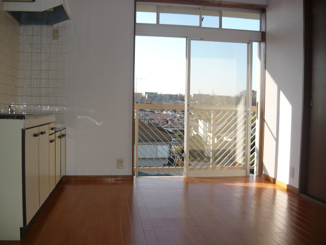 Living and room. Bright dining on the veranda surface. With skylight