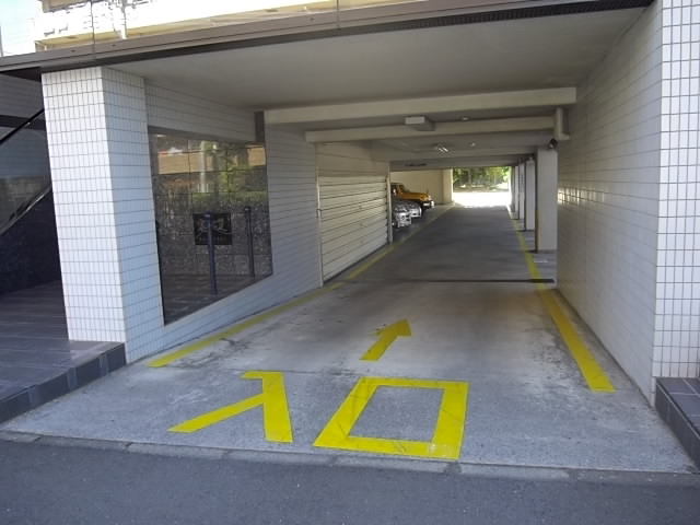 Parking lot. Slope there is a semi-underground parking