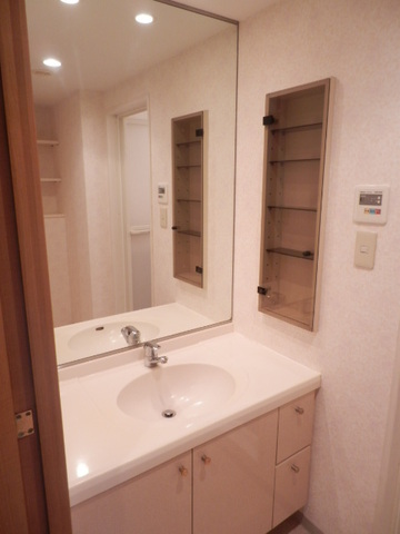 Washroom. It is vanity with storage.