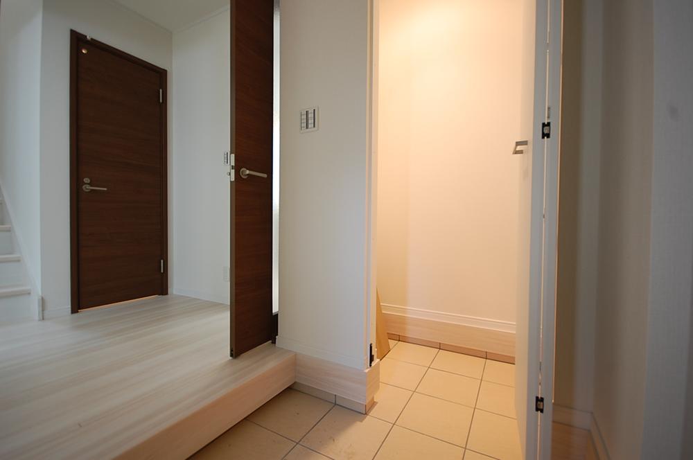 Entrance. Shoes with cloak