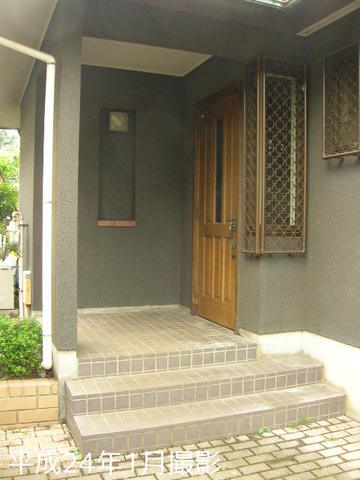 Entrance. There is a front door to the back of the car port