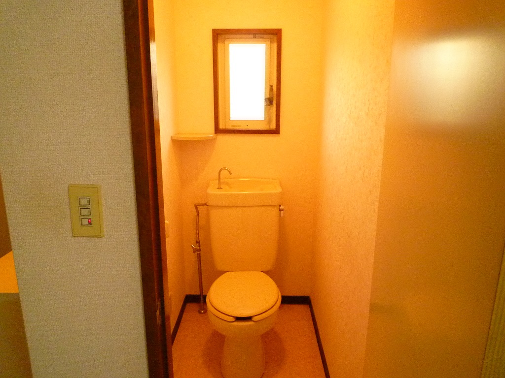 Toilet. There is also a window to the toilet