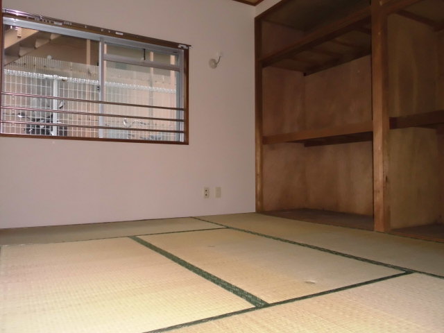Other room space. There is a window in Japanese-style room. The window is large floor plan in the living room