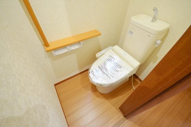 Toilet. First floor toilet with warm water washing toilet seat