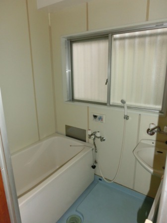 Bath. Bathroom with wash bowl. There is also a ventilation good window
