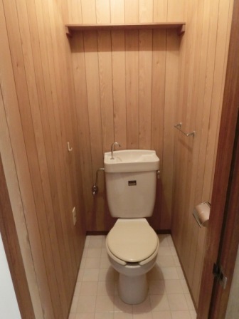 Toilet. toilet. With the top shelf