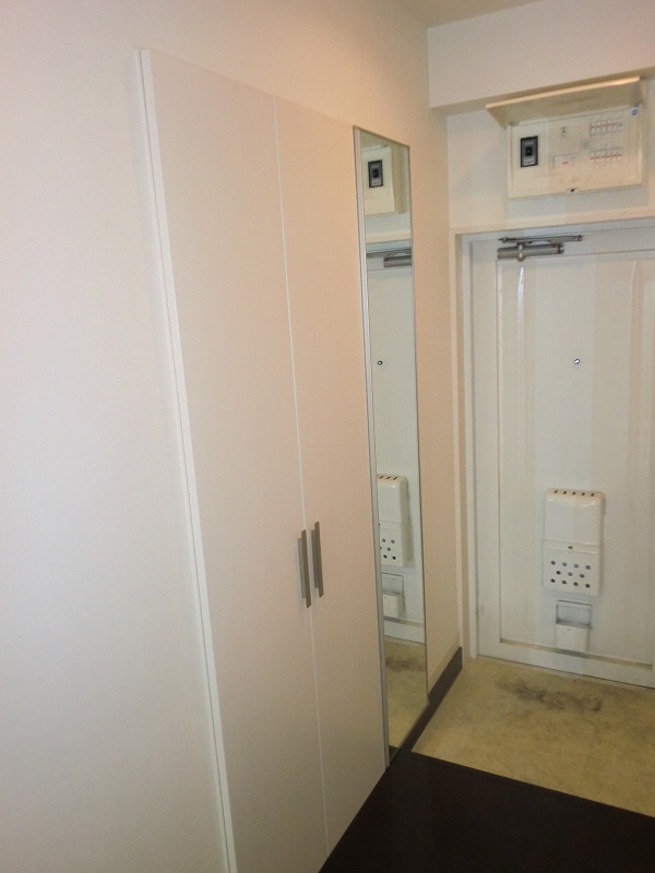 Entrance. With cupboard