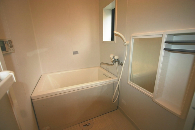 Bath. There is a window in the bathroom
