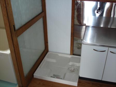 Other Equipment. Washing machine in the room with a waterproof bread