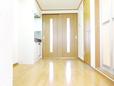 Living and room. Kitchen is spread