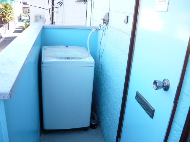 Other room space. Washing machine Storage ・ It is the front door next to