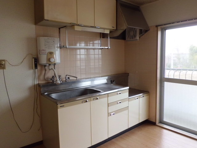 Kitchen. There is a kitchen immediately window next to brightly ventilation good