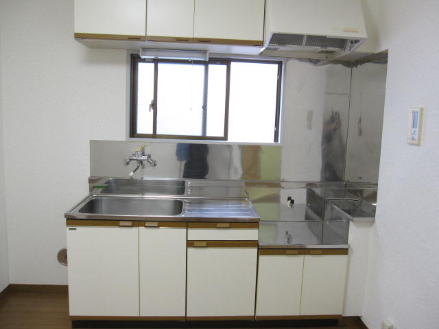 Kitchen. Bright kitchen with a window. Convenience ventilation.