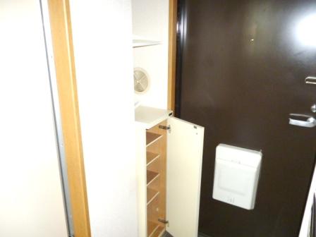 Entrance. With a shoe box
