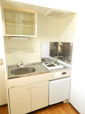 Kitchen. A small kitchen Gas stove 1-neck, With mini fridge