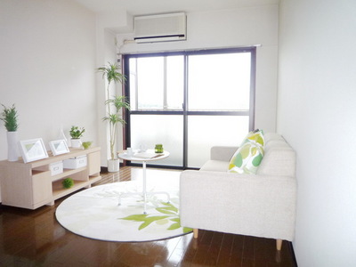 Living and room. It is a bright room