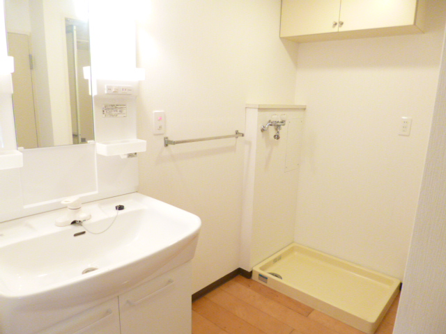 Washroom. Independent wash basin ・ Laundry Area is of course equipped