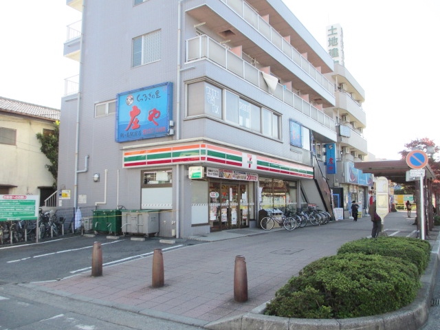 Convenience store. Seven-Eleven Tsurugashima Station West Exit store up (convenience store) 561m