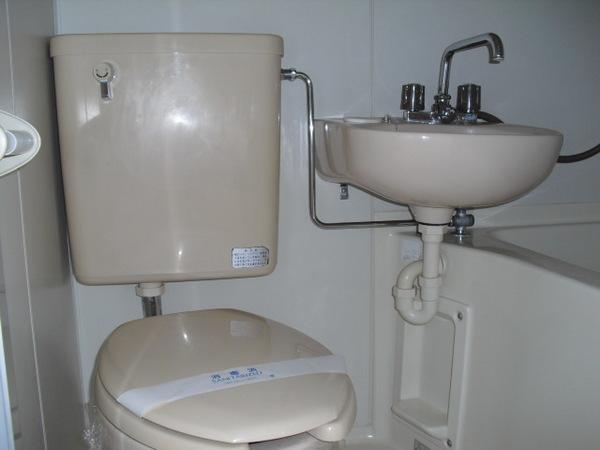 Toilet. Compact three-point