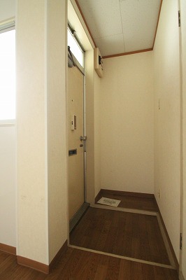 Entrance. It is a photograph of the same type of room.