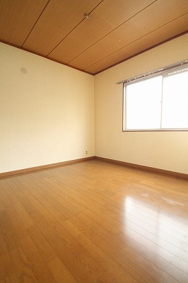 Other room space. It is a photograph of the same type of room.