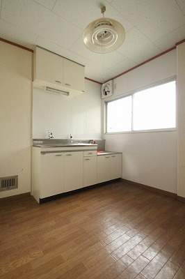 Kitchen. It is a photograph of the same type of room.