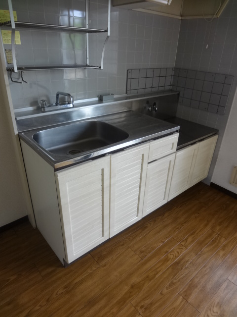Kitchen. It is a photograph of the same building another room