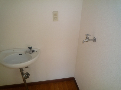 Washroom. It is a photograph of another in Room. 