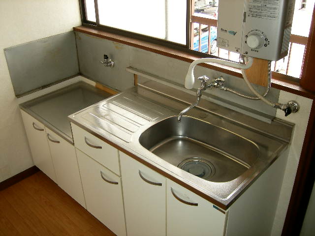 Kitchen. It is a photograph of another in Room. 