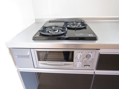 Kitchen. Gas two-burner stove (equivalent image. It is different from the real thing)