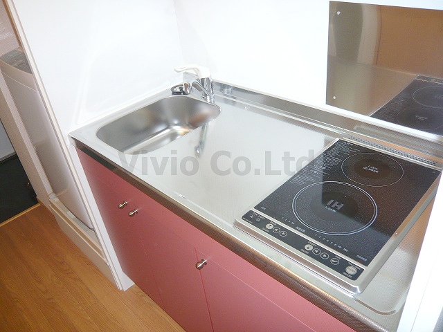 Kitchen. It is a wide type of kitchen. You can also enjoy cooking.