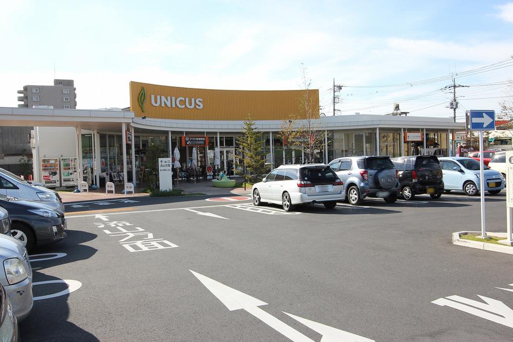 Shopping centre. Until UNICUS Yoshikawa 1334m